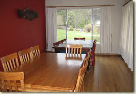 There is a large separate dining room with polished floorboards.
